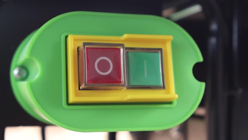 Finger pressing on off power switch button