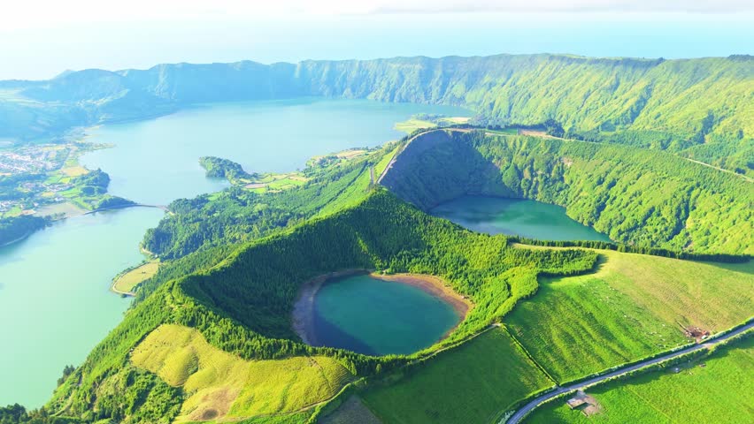 Sete Cidades Caldera at Sunset. Blue Lake, Green Lake, Rasa Lake and Santiago Lake. Green Fields and Hills. Azores, Sao Miguel Island. Portugal. Aerial View. Orbiting