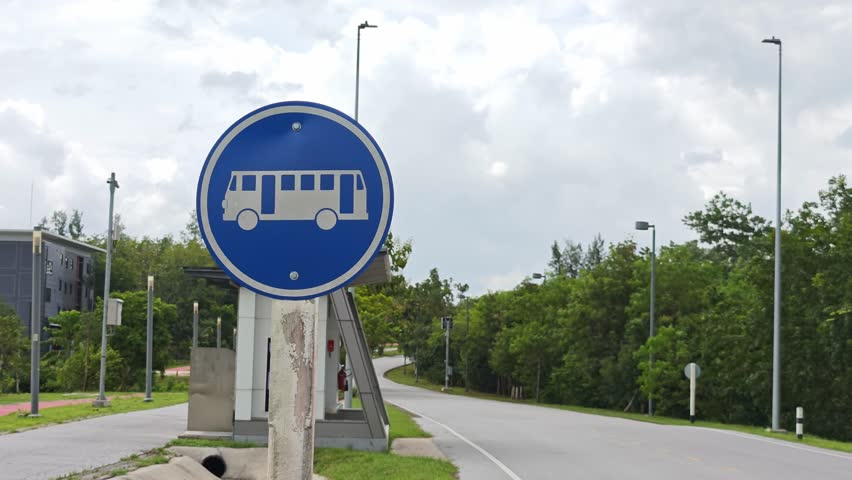 The bus stop is ahead, please be careful.