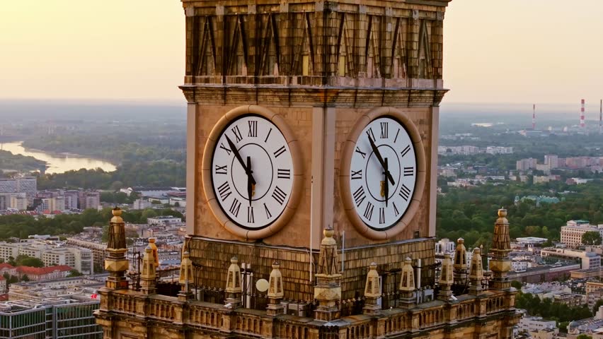 Epic aerial of iconic Warsaw clock tower at dawn as metaphor for rising markets - Powered by Shutterstock - Get 15% off with code: PIKWIZARD15