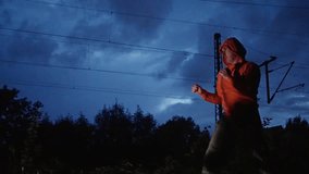 Talented Martial artist performs impressively, showcasing dynamic moves against a stunning, dramatic nighttime backdrop. Dynamic karate Moves Performed Under the Sparkling Night Sky. Slow motion - Powered by Shutterstock - Get 15% off with code: PIKWIZARD15