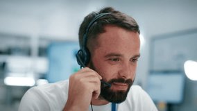 Portrait of Confident Customer Support Agent Smiling at camera, Male Call center Professional in Call center office. Confident Male Representative Portrait Facing Camera sit at help desk in office. - Powered by Shutterstock - Get 15% off with code: PIKWIZARD15