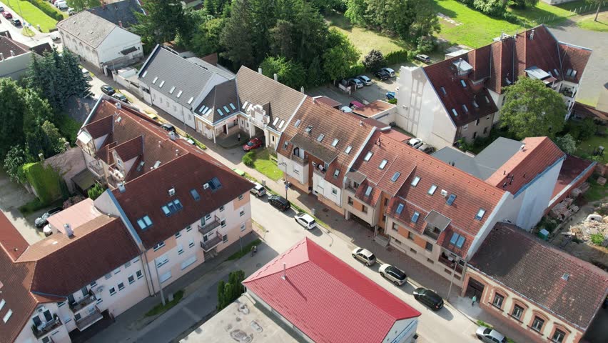Beautiful aerial drone panoramic view of Nagykanizsa, Hungary, showing traditional houses, streets and green gardens. Perfect for travel, tourism, and cultural promotion.