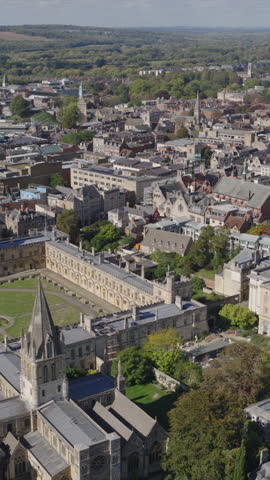 Vertical establishing aerial view of Oxford, United Kingdom. Beautiful city with prestigious university