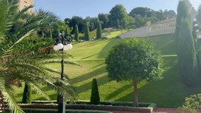 Haifa, Israel, 23 September 2025. Magnificent terraces of the lower tier of the Baháʼí Gardens with fountains, landscape design, and a marble staircase. - Powered by Shutterstock - Get 15% off with code: PIKWIZARD15
