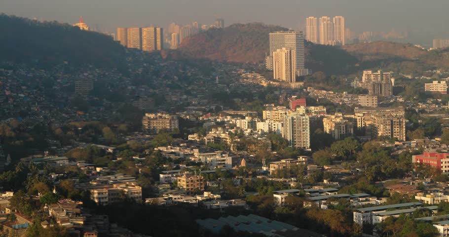 Barve Nagar, Ghatkopar West, Mumbai, Maharashtra, India. Mumbai Metropolitan Region. Aerial View From Airplane Window On View of the Mumbai suburb district. Evening morning sunset sunrise light.