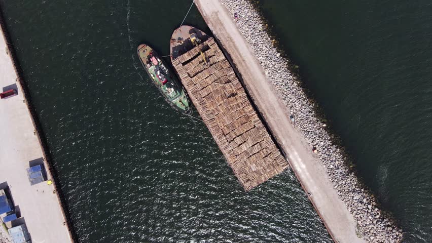 Logs Stored on a Ship, Before Departure in Port-menier, Quebec, Canada