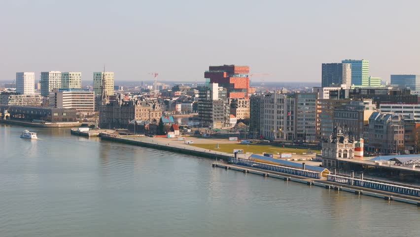 skyline antwerp belgium boats scheldt river historical buildings colorful city scenic urban area infrastructure journey transportation aerial view