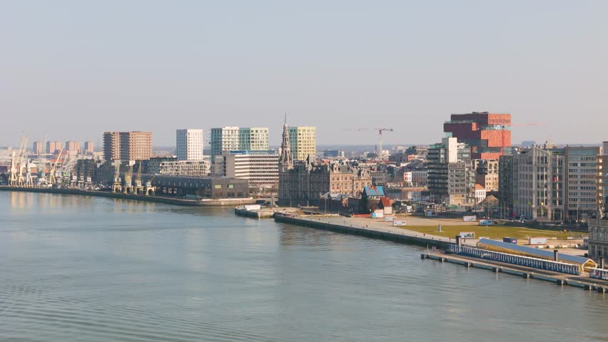 skyline antwerp belgium historical buildings banks colorful city modern structures prominence scenic urban area infrastructure journey aerial drone shot view