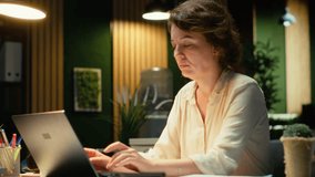 Female assistant engaging in a phone call after hours at the office, giving insight on financial data reports and other metrics for accounting. Chatting on a smartphone connection. Camera B. - Powered by Shutterstock - Get 15% off with code: PIKWIZARD15