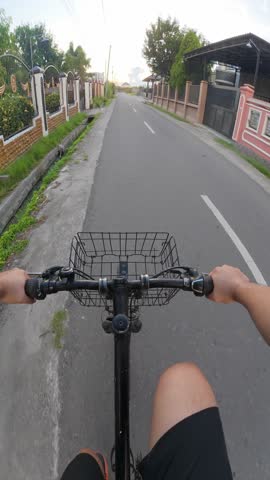 First-Person View of Cycling on Road. POV