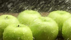 Fresh green apples are being washed with water droplets on their surface - Powered by Shutterstock - Get 15% off with code: PIKWIZARD15