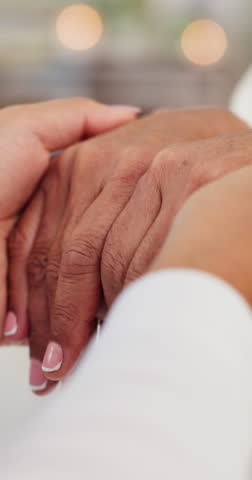 Women, holding hands and comfort senior person with bad news, depression and support for empathy. Bokeh, people and helping gesture of sympathy, mental health crisis and guidance for cancer diagnosis