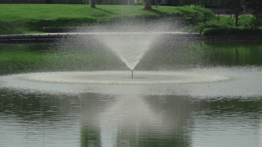  Slow-motion of water splash in a pool in a park
