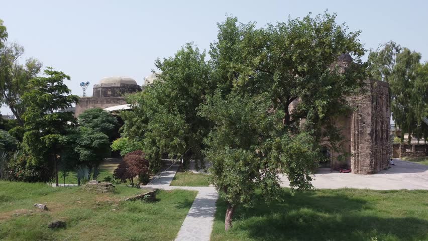 Cinematic slow moving view of Rawat Fort Pakistan highlighting ancient Mughal heritage architecture and cultural historic site