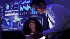 Corporate Business Meeting in Virtual Reality Office Space. A real male manager stands in front of the meeting room and two female specialists sit and listen. Metaverse usage with business concept. - Powered by Shutterstock - Get 15% off with code: PIKWIZARD15