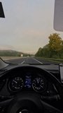 Driving on a Scenic Highway person perspective - Powered by Shutterstock - Get 15% off with code: PIKWIZARD15