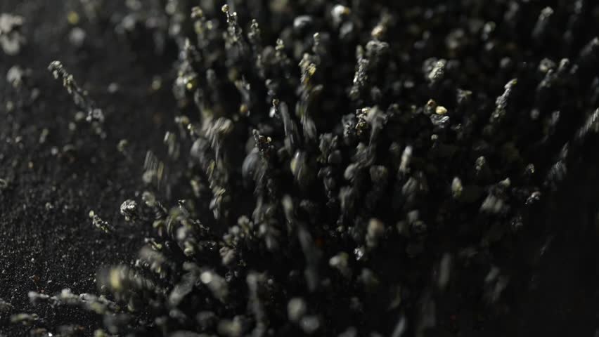 Magnetic Volcanic Particles Forming Spikes Macro