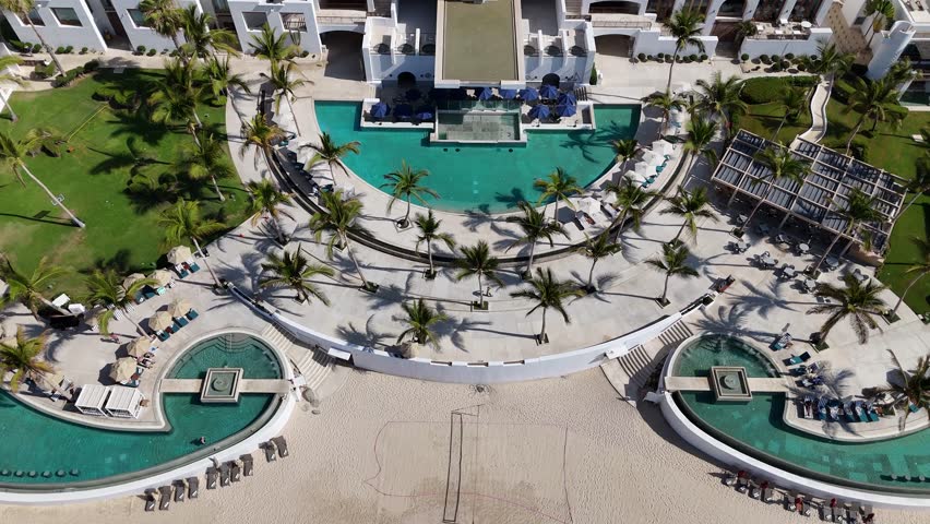 Reveling Drone Shot of Cabo San Lucas Luxury Resort Hotel WIth Swimming Pools, Mexico