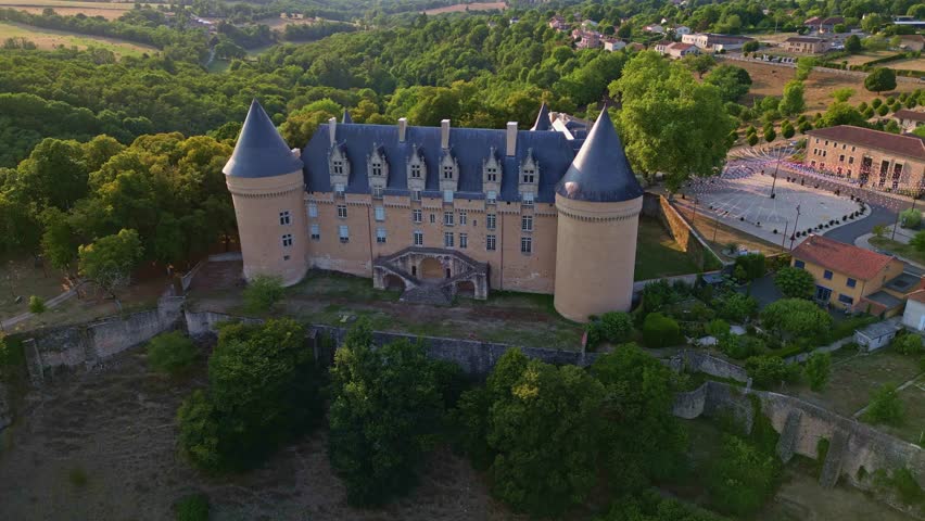 Château de Rochechouart, medieval castle, Departmental Museum of Contemporary Art, Haute-Vienne, France. Aerial forward