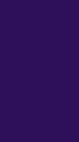 Spooky Halloween night with illuminated carved pumpkins, flying bats, and a full moon against a starry purple sky. Perfect for holiday themes.