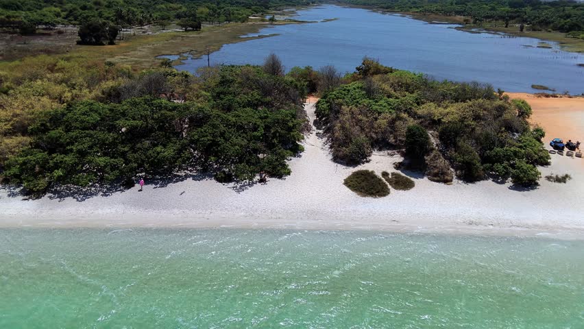 Aerial panorama of Paradise Lagoon, turquoise water and lush tropical surroundings, Jericoacoara.