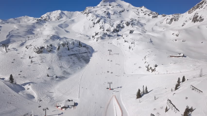 Aerial view of skiers on ski slopes Obertauern, Salzburger Land of Austria.