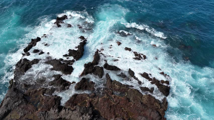 Drone Shot of Sea Wave Crashing Over Rock in Tenerife. Above View of Stone and Atlantic Ocean in Canary Islands.