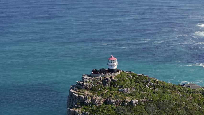 Aerial view of the Old Lighthouse at Cape Point with the iconic Cape of Good Hope in the background at Cape Peninsula, near Cape Town, South Africa. 