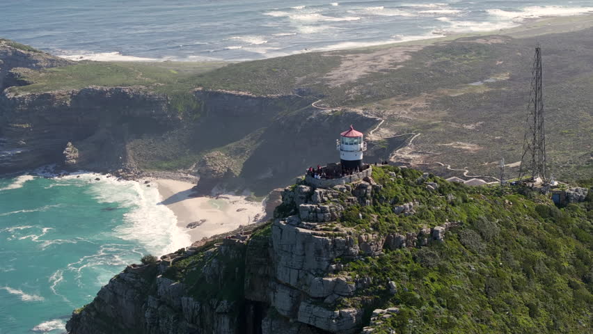 Aerial view of the Old Lighthouse at Cape Point with the iconic Cape of Good Hope in the background at Cape Peninsula, near Cape Town, South Africa. 