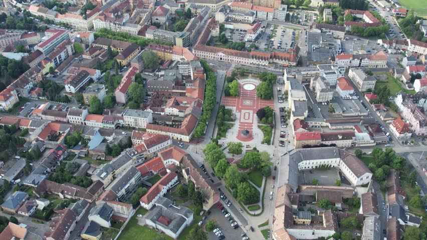 Beautiful aerial drone panoramic view of Nagykanizsa, Hungary, showing traditional houses, streets and green gardens. Perfect for travel, tourism, and cultural promotion.