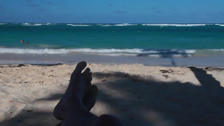 Relaxing. feet at the ocean, pov