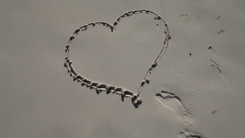 Heart in Sand is washed away