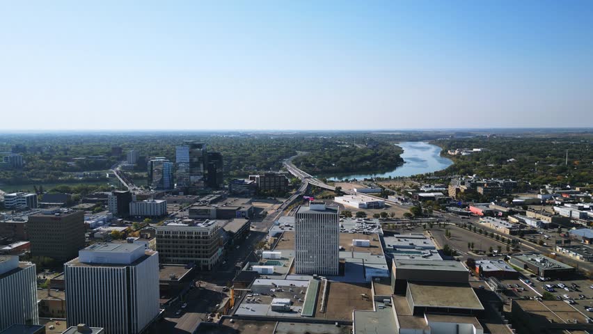 Aerial view shows South Saskatchewan River flowing through Saskatoon in fall