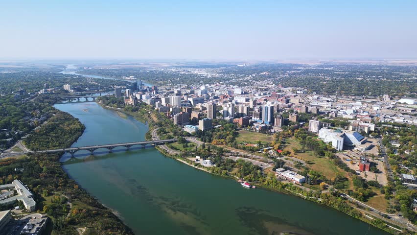Aerial view of Saskatoon downtown in autumn, river and bridges stretching out