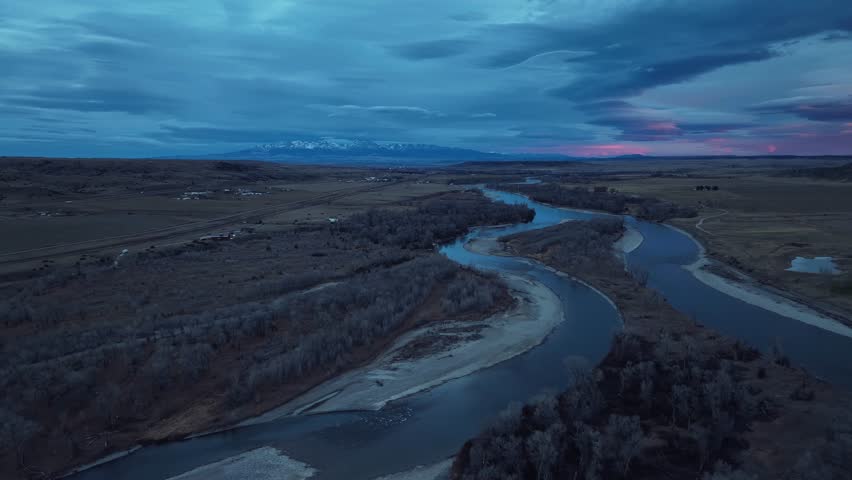 Aerial drone view of highway and lakes in Montana USA at sunset