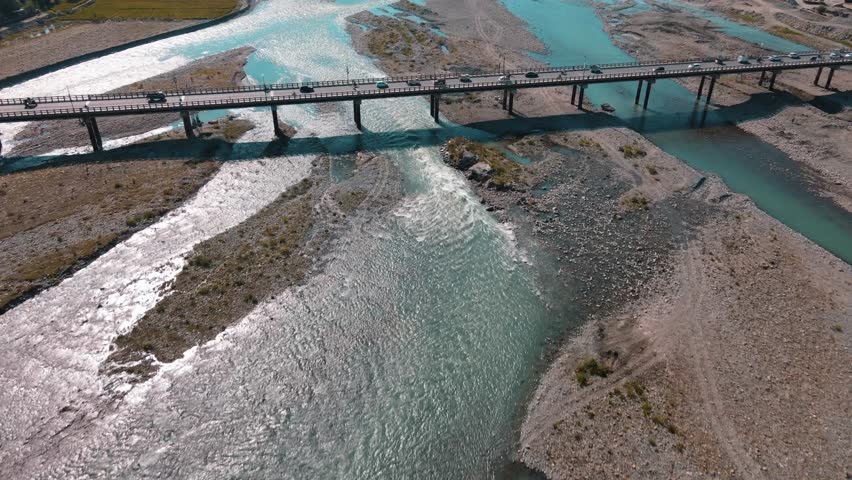 4K Cinematic Drone Footage of Bridge Over River with Cars Crossing – Aerial View of Swat Valley, Pakistan