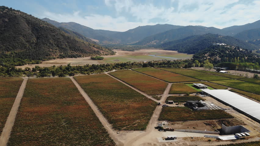 Aerial view of vineyard and winery in mountain valley