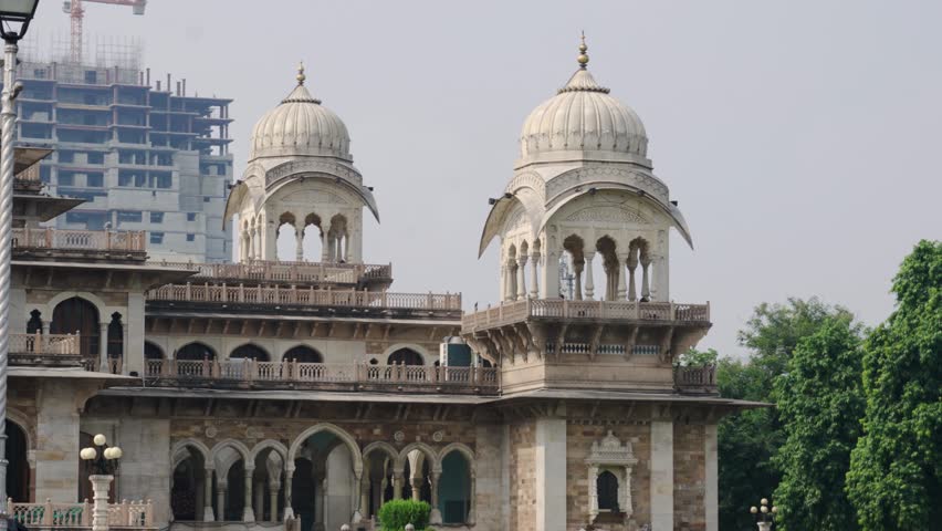 A sweeping tracking shot of Albert Hall Museum in Rajasthan, revealing the intricate Indo-Saracenic architecture in a calm, empty public space.