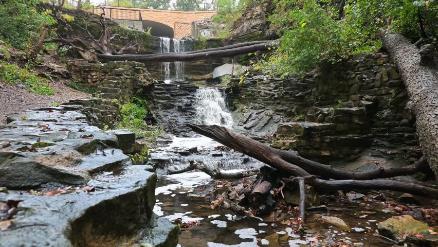 Waterfall Cascading through Autumn Foliage, Hidden Falls Regional Park in St. Paul Minnesota in late September