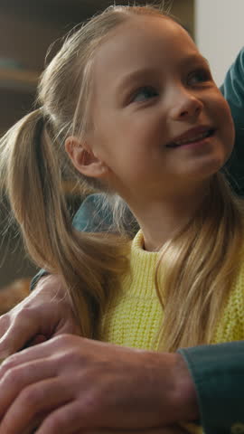 Happy family cooking at kitchen smiling father with daughter talking carefree cook vegan dinner vegetarian food Caucasian dad teach kid girl child cutting cucumber helping using knife prepare salad