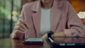 Tech-savvy woman using digital tablet, stylus and smartwatch for remote work, multitasking and digital efficiency - Powered by Shutterstock - Get 15% off with code: PIKWIZARD15