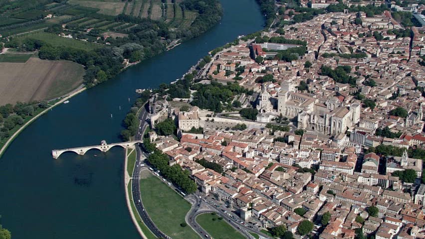 Aerial view of avignon, france, featuring the rhne river and historic architecture