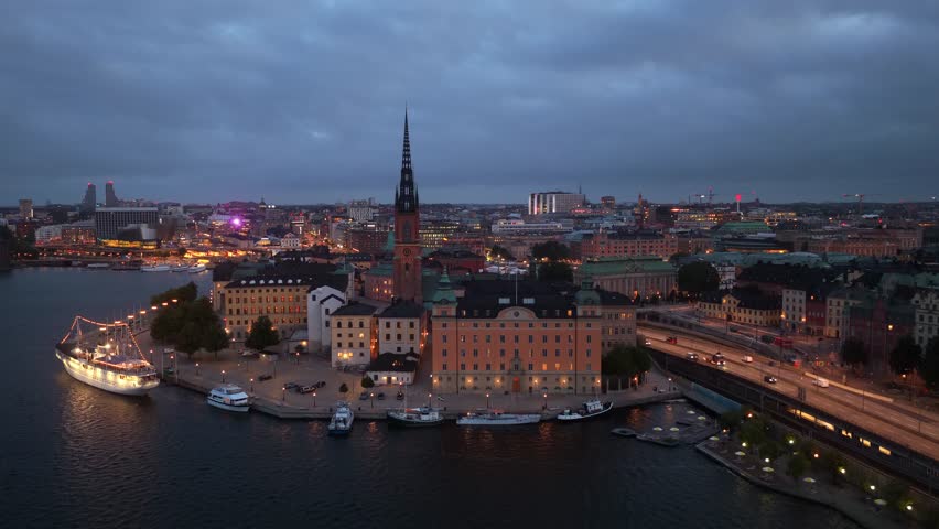 night drone shot of Stockholm city centre, aerial view of Stockholm at dusk, the capital of Sweden, travel in Scandinavian countries. High quality 4k footage