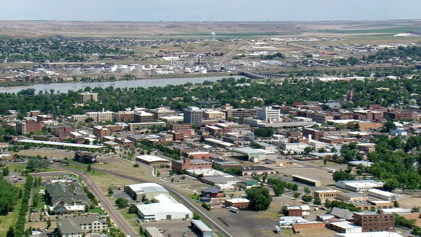 An aerial view captures the cityscape of billings, montana on a sunny day
