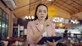 Confident businesswoman using digital data analytics interface with graphs and global map for strategy planning, management, and decision making in modern business environment. - Powered by Shutterstock - Get 15% off with code: PIKWIZARD15