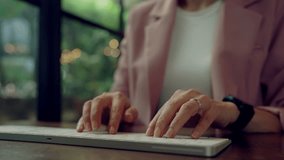 Close-up of hands typing on laptop with futuristic digital data analytics, graphs, and global map interface, representing business intelligence, data analysis, and strategy. - Powered by Shutterstock - Get 15% off with code: PIKWIZARD15