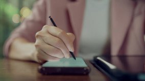 Close-up of businesswoman using stylus on digital tablet with holographic map and marketing circle chart, representing global segmentation, marketing strategy, data visualization - Powered by Shutterstock - Get 15% off with code: PIKWIZARD15