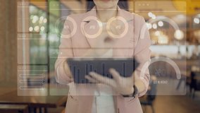 Asian businesswoman touching a virtual screen with futuristic digital dashboard, displaying data charts, circle graphs, and sliders - Powered by Shutterstock - Get 15% off with code: PIKWIZARD15