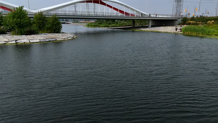 Flying under Biidaasige Park bridge in Toronto, ON